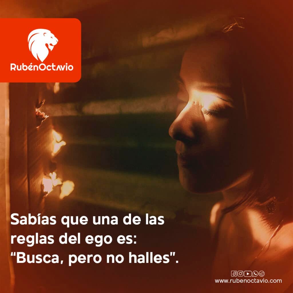 Rostro iluminado por una rendija de luz entre sombras, simbolizando cómo el ego opera oculto.