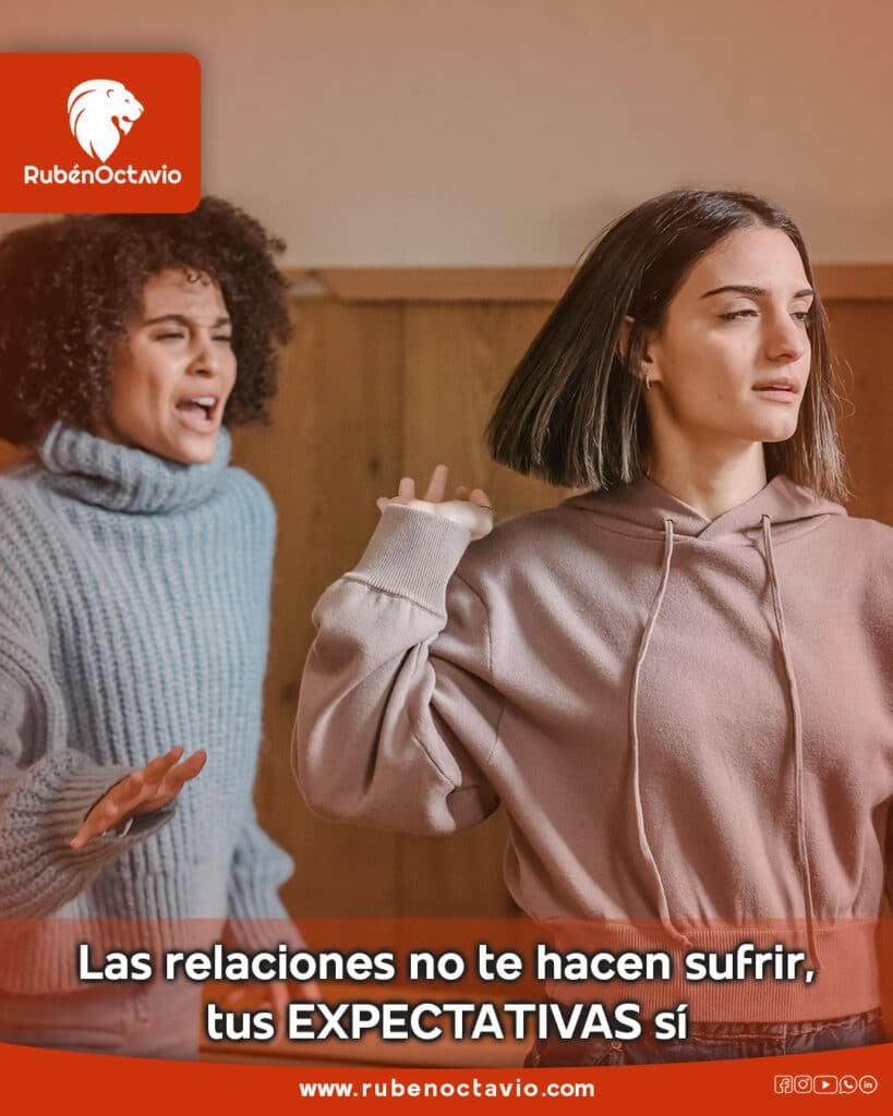 Dos personas discutiendo mientras una se aleja, simbolizando el sufrimiento causado por las expectativas del ego.
