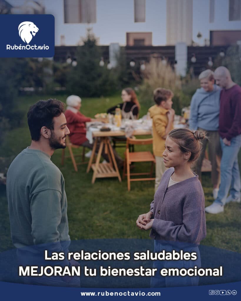 Personas conversando en un jardín durante una reunión social, simbolizando relaciones saludables.